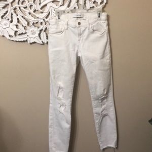 J BRAND 24 white ripped skinny jeans.